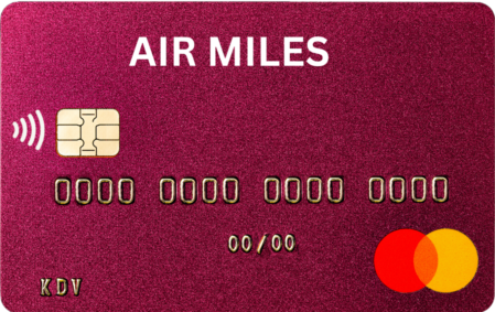 Traveler holding airline and hotel loyalty cards