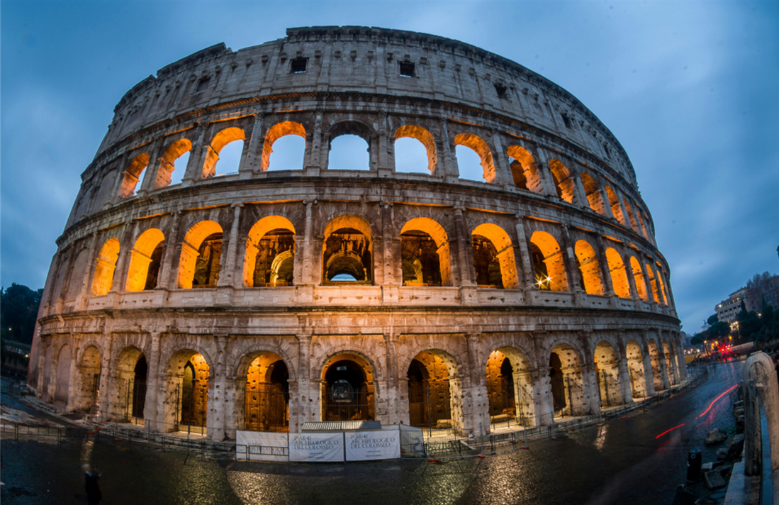 Couple strolling in a historic Italian street