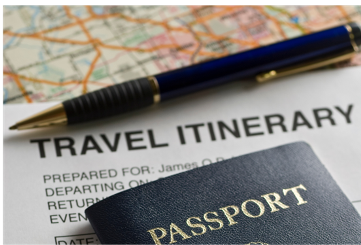 Traveler checking itinerary and packing list